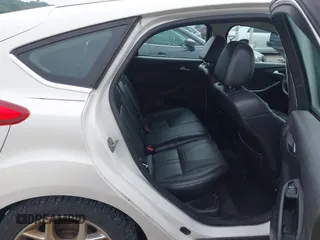 2014 Ford Focus Titanium with VIN 1FADP3N24EL184220, listed as a IAAI auction lot 42429610 with 172,575 mi miles and . Bid and sale history available at DreamBid. Image 8.