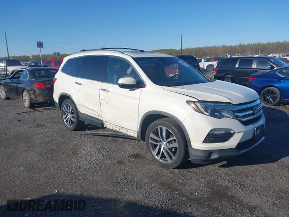 2017 Honda Pilot Elite with VIN 5FNYF6H00HB032386, listed as a IAAI auction lot 41976702 with 153,251 mi miles and . Bid and sale history available at DreamBid. Image 1.