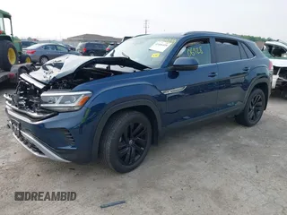 2022 Volkswagen Atlas SE z VIN 1V2KC2CA9NC216742, wystawiony jako IAAI lot #42406428 z przebiegiem 34 598 mil mil oraz . Historia ofert i sprzedaży dostępna na DreamBid. Obrazek 2.