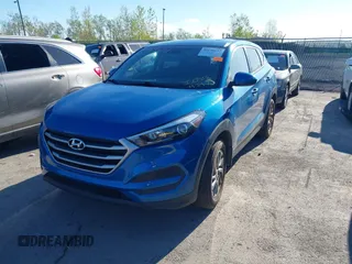 2018 Hyundai Tucson SE z VIN KM8J2CA40JU792495, wystawiony jako IAAI lot #42144647 z przebiegiem 62 769 mil mil oraz . Historia ofert i sprzedaży dostępna na DreamBid. Obrazek 2.
