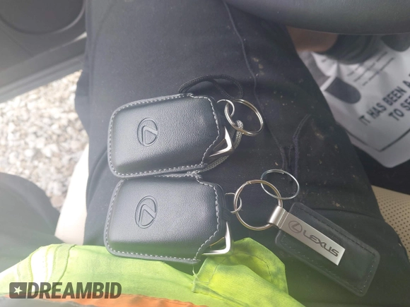 2022 Lexus RX 350 z VIN 2T2HZMDA1NC352550, wystawiony jako IAAI lot #42024421 z przebiegiem Nie podano mil oraz . Historia ofert i sprzedaży dostępna na DreamBid. Obrazek 11.
