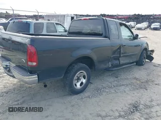 2003 Ford F-150 XL with VIN 1FTRX17W53NB19575, listed as a IAAI auction lot 41711599 with 1 mi miles. Bid and sale history available at carsss.com. Image 4.