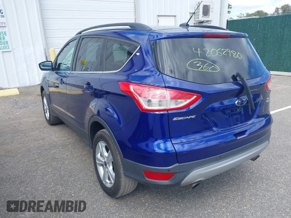 2014 Ford Escape SE with VIN 1FMCU9G93EUC54050, listed as a IAAI auction lot 42062980 with 129,015 mi miles. Bid and sale history available at carsss.com. Image 3.