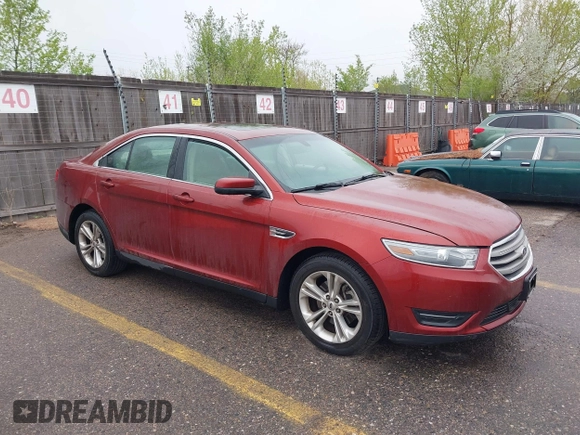 2014 Ford Taurus SEL with VIN 1FAHP2E86EG146478, listed as a IAAI auction lot 42131865 with 124,204 mi miles and . Bid and sale history available at DreamBid. Image 1.