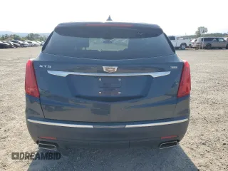 2019 Cadillac XT5 Premium Luxury FWD with VIN 1GYKNERS8KZ214013, listed as a Copart auction lot 59239635 with 82,862 mi miles and Salvage title. Bid and sale history available at DreamBid. Image 6.