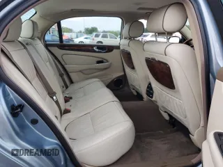 2005 Jaguar XJ VDP with VIN SAJWA82C45SG36059, listed as a Copart auction lot 69289734 with 0 mi miles and Salvage Title. Bid and sale history available at carsss.com. Image 10.
