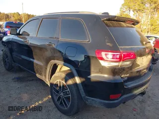 2018 Jeep Grand Cherokee Trailhawk with VIN 1C4RJFLT2JC349450, listed as a IAAI auction lot 40848526 with 139,326 mi miles and . Bid and sale history available at DreamBid. Image 3.