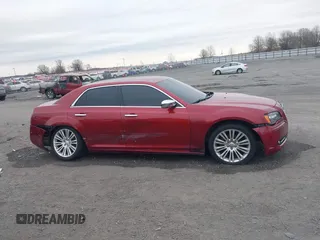 2012 Chrysler 300 Limited z VIN 2C3CCACG7CH250858, wystawiony jako IAAI lot #41709739 z przebiegiem 236 991 mil mil oraz . Historia ofert i sprzedaży dostępna na DreamBid. Obrazek 13.