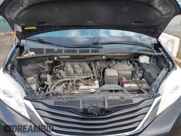 2013 Toyota Sienna LE AAS with VIN 5TDKK3DC8DS401419, listed as a IAAI auction lot 42007146 with 182,651 mi miles. Bid and sale history available at carsss.com. Image 10.