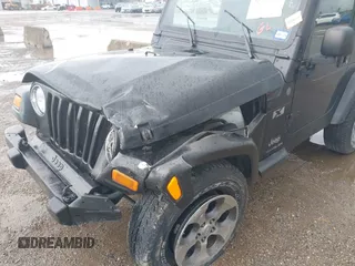 2004 Jeep Wrangler X with VIN 1J4FA39S34P753865, listed as a IAAI auction lot 41948545 with 198,169 mi miles. Bid and sale history available at carsss.com. Image 6.