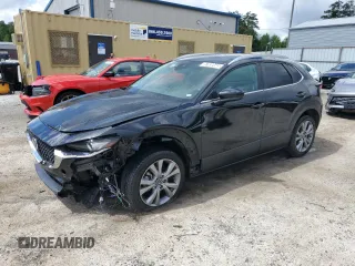 2023 Mazda CX-30 S Select z VIN 3MVDMBBM0PM529441, wystawiony jako Copart lot #57039445 z przebiegiem 60 090 mil mil oraz Czysty tytuł • Clean title. Historia ofert i sprzedaży dostępna na DreamBid. Obrazek 1.