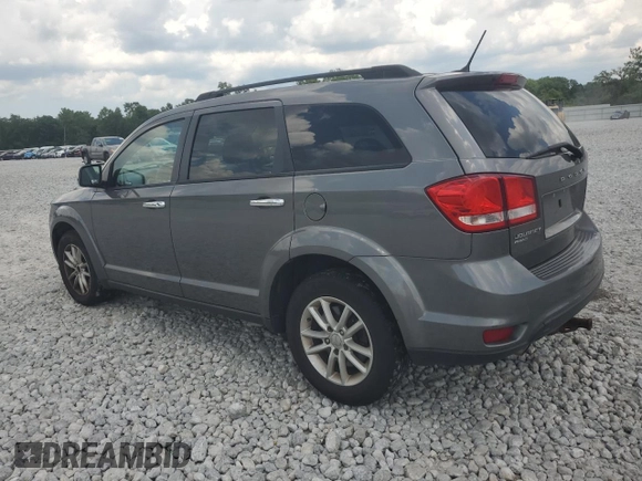 2013 Dodge Journey SXT with VIN 3C4PDDBG3DT507553, listed as a Copart auction lot 62889505 with 179,388 mi miles and Clean title. Bid and sale history available at DreamBid. Image 2.