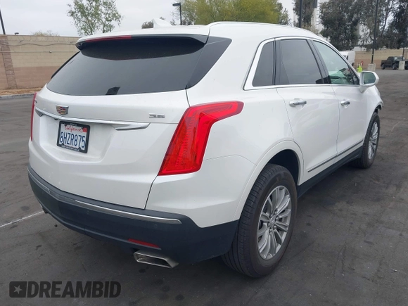 2019 Cadillac XT5 Luxury FWD with VIN 1GYKNCRS2KZ158560, listed as a IAAI auction lot 42067397 with 48,816 mi miles and . Bid and sale history available at DreamBid. Image 4.