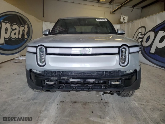 2022 Rivian R1T Launch Edition with VIN 7FCTGAAL7NN006406, listed as a Copart auction lot 49970755 with 1,517 mi miles and Clean Title. Bid and sale history available at carsss.com. Image 5.