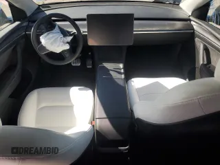 2022 Tesla Model Y Long Range z VIN 7SAYGAEE5NF573044, wystawiony jako Copart lot #49230835 z przebiegiem 41 220 mil mil oraz Szkody całkowita. Historia ofert i sprzedaży dostępna na DreamBid. Obrazek 8.