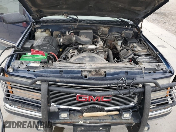 1999 GMC Suburban z VIN 1GDFK16R9XJ771458, wystawiony jako Copart lot #43412175 z przebiegiem 159 328 mil mil oraz Szkody całkowita. Historia ofert i sprzedaży dostępna na DreamBid. Obrazek 12.