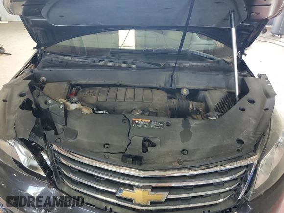 2016 Chevrolet Traverse LT z VIN 1GNKVGKD2GJ282463, wystawiony jako Copart lot #56214575 z przebiegiem 96 696 mil mil oraz Szkoda całkowita • Salvage title. Historia ofert i sprzedaży dostępna na DreamBid. Obrazek 12.