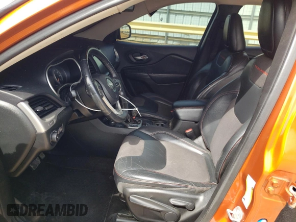 2015 Jeep Cherokee Trailhawk with VIN 1C4PJMBB5FW600455, listed as a Copart auction lot 53859365 with 164,420 mi miles and Salvage Title. Bid and sale history available at DreamBid. Image 7.