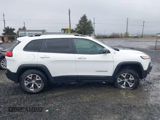 2018 Jeep Cherokee Trailhawk with VIN 1C4PJMBBXJD567022, listed as a IAAI auction lot 41834618 with 41,017 mi miles and . Bid and sale history available at DreamBid. Image 13.