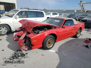 1992 Pontiac Firebird with VIN 1G2FS33E9NL207199, listed as a Copart auction lot 82141304 with 86,424 mi miles and Salvage Title. Bid and sale history available at carsss.com. Image 1.