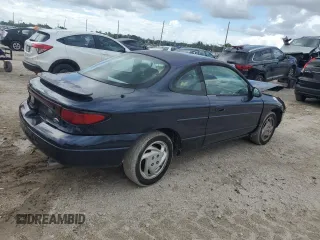 2001 Ford Escort ZX2 with VIN 3FAFP11371R157858, listed as a Copart auction lot 69687724 with 97,833 mi miles and Salvage Title. Bid and sale history available at carsss.com. Image 3.