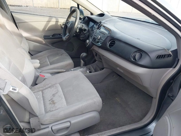 2011 Honda Insight EX with VIN JHMZE2H75BS006078, listed as a IAAI auction lot 41755652 with 209,774 mi miles. Bid and sale history available at carsss.com. Image 5.