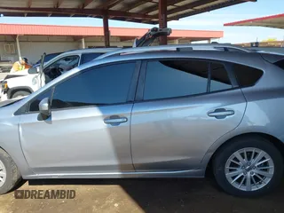 2017 Subaru Impreza Premium z VIN 4S3GTAB69H3703779, wystawiony jako IAAI lot #42151284 z przebiegiem 135 455 mil mil oraz . Historia ofert i sprzedaży dostępna na DreamBid. Obrazek 14.