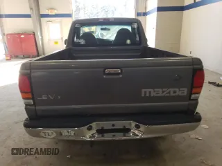 2000 Mazda B-Series 2WD Truck SX with VIN 4F4YR12V7YTM24901, listed as a Copart auction lot 86050364 with 230,776 mi miles and Clean Title. Bid and sale history available at carsss.com. Image 6.