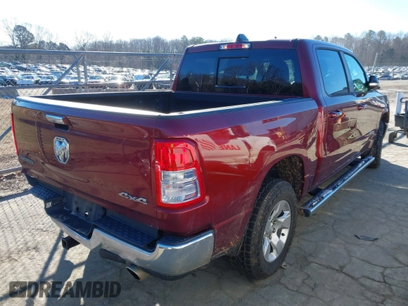 2019 Ram 1500 Big Horn/Lone Star with VIN 1C6SRFFT8KN870451, listed as a IAAI auction lot 41639815 with 100,924 mi miles. Bid and sale history available at carsss.com. Image 4.
