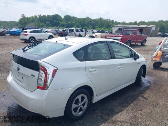 2015 Toyota Prius Four with VIN JTDKN3DU2F0424586, listed as a IAAI auction lot 42502544 with 281,407 mi miles and . Bid and sale history available at DreamBid. Image 4.