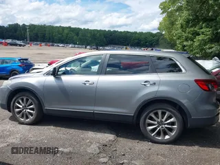 2014 Mazda CX-9 Grand Touring с VIN JM3TB2DA3E0443604, выставлен на аукционе IAAI как лот 42456552 с пробегом 150 053 миль миль и . История ставок и продаж доступна на DreamBid. Изображение 14.