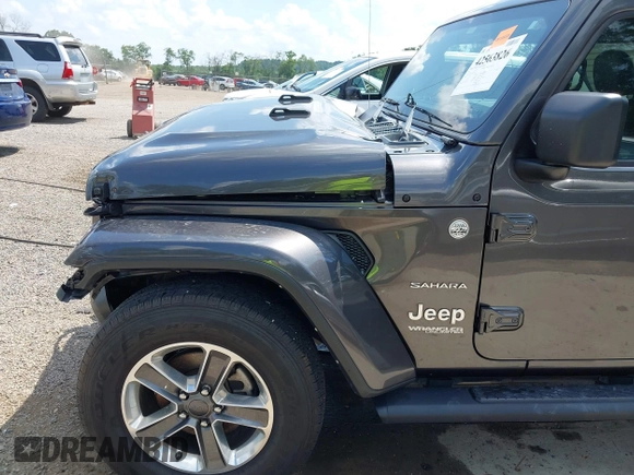2022 Jeep Wrangler Unlimited Sahara Altitude z VIN 1C4HJXEG6NW103779, wystawiony jako IAAI lot #42563826 z przebiegiem 79 315 mil mil oraz . Historia ofert i sprzedaży dostępna na DreamBid. Obrazek 19.