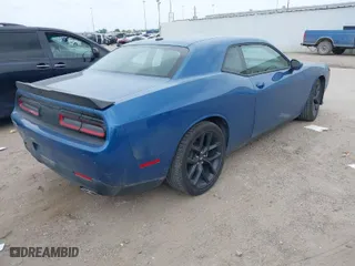 2023 Dodge Challenger GT with VIN 2C3CDZJG8PH582151, listed as a IAAI auction lot 41884343 with 34,259 mi miles. Bid and sale history available at carsss.com. Image 4.