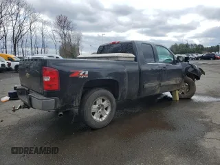 2010 Chevrolet Silverado 1500 LT with VIN 1GCSKSE38AZ186997, listed as a Copart auction lot 52300975 with 107,464 mi miles and Salvage Title. Bid and sale history available at DreamBid. Image 3.