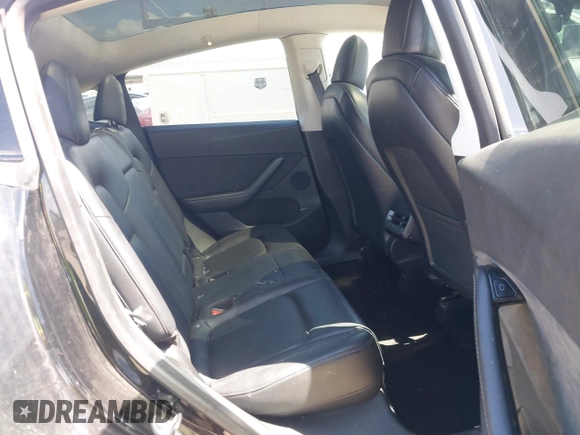 2020 Tesla Model Y Long Range with VIN 5YJYGDEE2LF059177, listed as a IAAI auction lot 41916260 with 66,190 mi miles and . Bid and sale history available at DreamBid. Image 8.