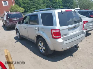 2010 Ford Escape Limited z VIN 1FMCU9EG7AKC87480, wystawiony jako IAAI lot #42748832 z przebiegiem 86 566 mil mil oraz . Historia ofert i sprzedaży dostępna na DreamBid. Obrazek 3.
