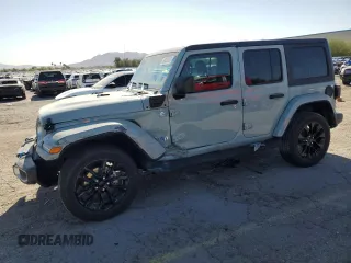 2023 Jeep Wrangler Sahara with VIN 1C4JJXP69PW559414, listed as a Copart auction lot 52623055 with 29,950 mi miles and Salvage title. Bid and sale history available at DreamBid. Image 1.