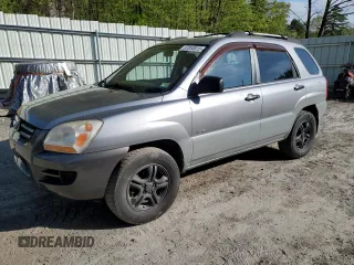 2007 Kia Sportage LX z VIN KNDJE723X77430674, wystawiony jako Copart lot #57050615 z przebiegiem 136 731 mil mil oraz Szkoda całkowita • Salvage title. Historia ofert i sprzedaży dostępna na DreamBid. Obrazek 1.