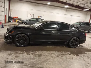 2015 Audi A6 2.0T Premium Plus with VIN WAUGFAFC7FN012983, listed as a IAAI auction lot 41086404 with 145,358 mi miles. Bid and sale history available at carsss.com. Image 15.