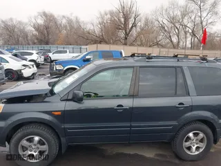 2006 Honda Pilot EX-L with VIN 2HKYF18526H563831, listed as a IAAI auction lot 41255427 with 237,074 mi miles. Bid and sale history available at carsss.com. Image 14.