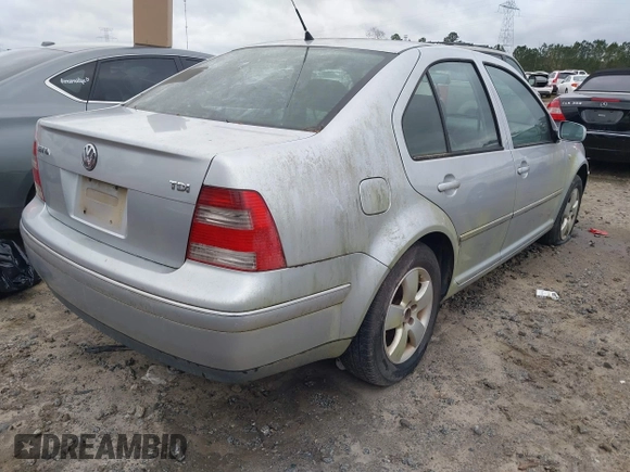 2004 Volkswagen Jetta GLS with VIN 3VWSR69MX4M065963, listed as a IAAI auction lot 41091439 with 196,158 mi miles and . Bid and sale history available at DreamBid. Image 4.