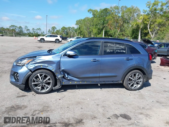 2021 Kia Niro Touring with VIN KNDCC3LC3M5483455, listed as a IAAI auction lot 41678795 with 132,216 mi miles. Bid and sale history available at carsss.com. Image 14.