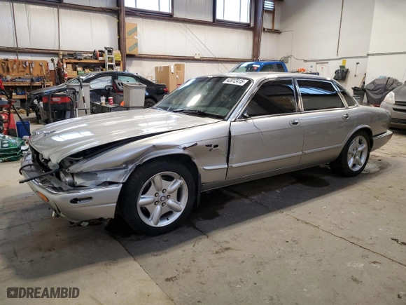 1999 Jaguar XJ Series Sedan with VIN SAJPF1845XC872355, listed as a Copart auction lot 42012415 with NaN miles and Salvage Title. Bid and sale history available at carsss.com. Image 1.