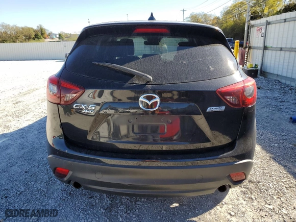 2016 Mazda CX-5 Grand Touring with VIN JM3KE4DY7G0871769, listed as a Copart auction lot 75835094 with 142,180 mi miles and Salvage Title. Bid and sale history available at carsss.com. Image 6.