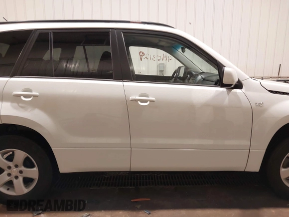 2006 Suzuki Grand Vitara Premium with VIN JS3TD943664100584, listed as a IAAI auction lot 41453129 with 159,220 mi miles and . Bid and sale history available at DreamBid. Image 13.