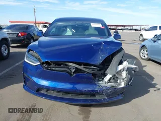 2022 Tesla Model X with VIN 7SAXCDE58NF341112, listed as a IAAI auction lot 41632491 with Not Provided miles and . Bid and sale history available at DreamBid. Image 12.