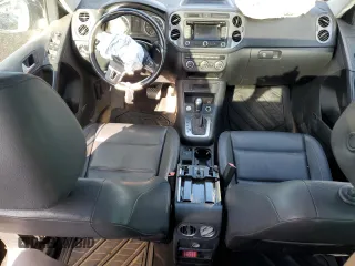2014 Volkswagen Tiguan SEL with VIN WVGAV3AX5EW558929, listed as a Copart auction lot 71004684 with 125,628 mi miles and Clean title. Bid and sale history available at DreamBid. Image 8.
