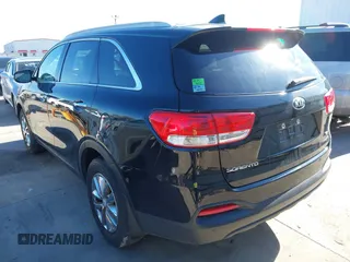 2018 Kia Sorento LX with VIN 5XYPG4A39JG342455, listed as a IAAI auction lot 41366386 with 131,033 mi miles. Bid and sale history available at carsss.com. Image 3.