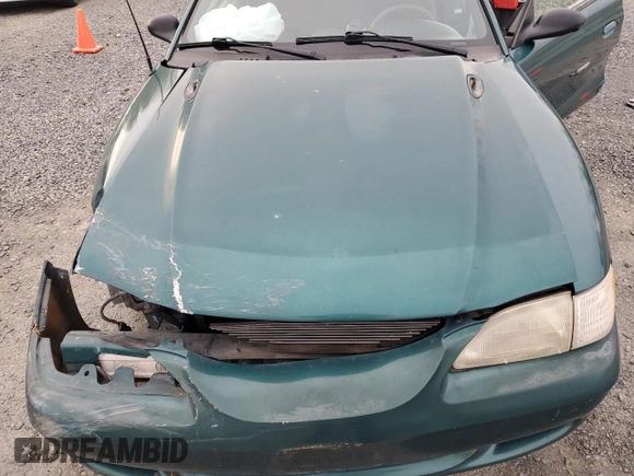 1997 Ford Mustang with VIN 1FALP4044VF101619, listed as a Copart auction lot 52646555 with 189,003 mi miles and Salvage Title. Bid and sale history available at carsss.com. Image 11.