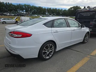 2020 Ford Fusion SEL with VIN 3FA6P0CD1LR154201, listed as a IAAI auction lot 42715761 with 99,448 mi miles and . Bid and sale history available at DreamBid. Image 12.